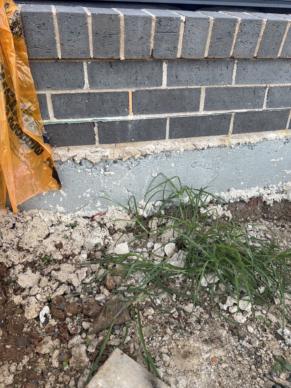 Base mortar bed over the 20mm limit along the bottom course of bricks, found during a fixing stage inspection in Rouse Hill