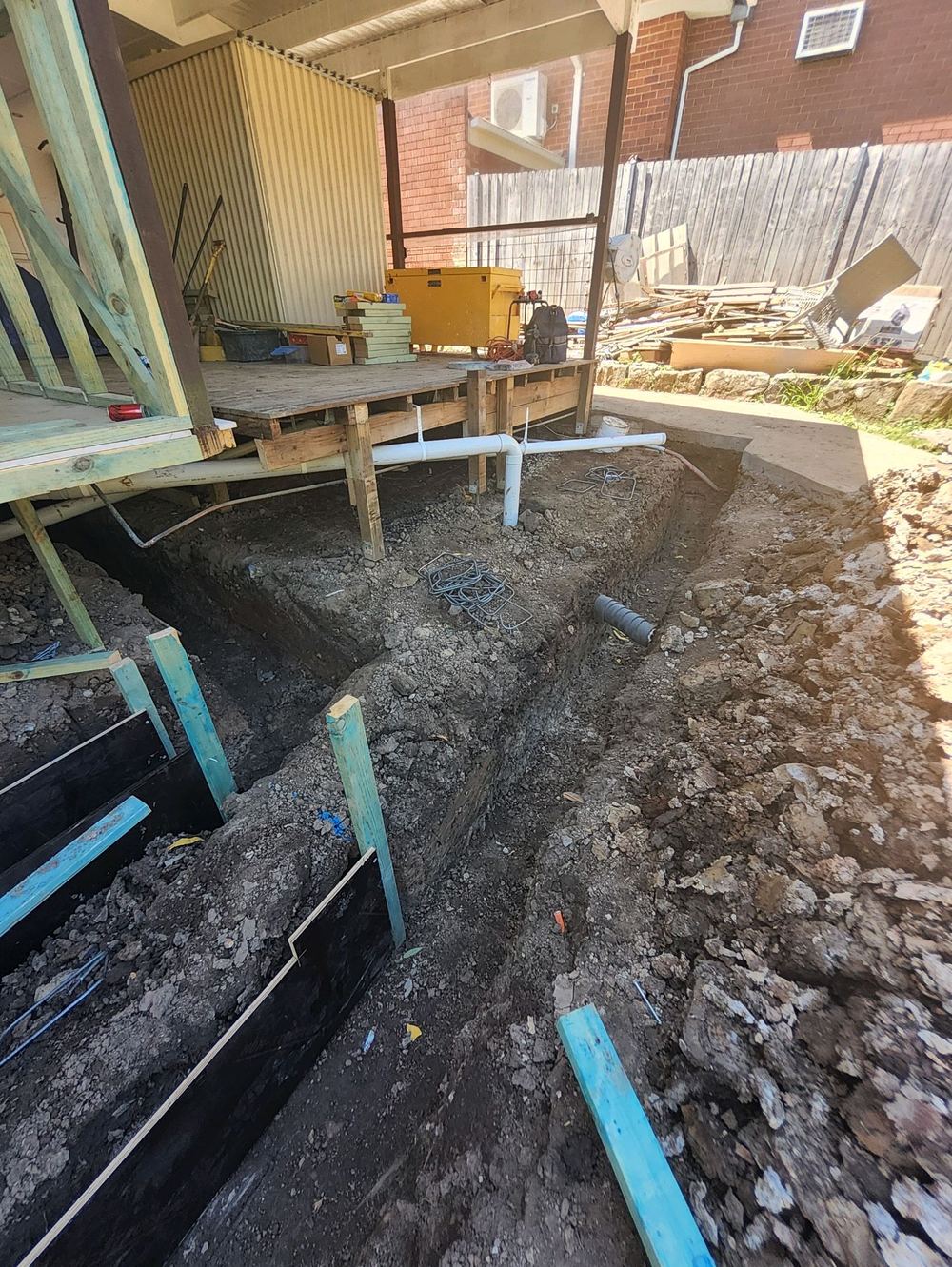 Termite collars not fitted to plumbing penetrations, found during a bored pier inspection in Pennant Hills