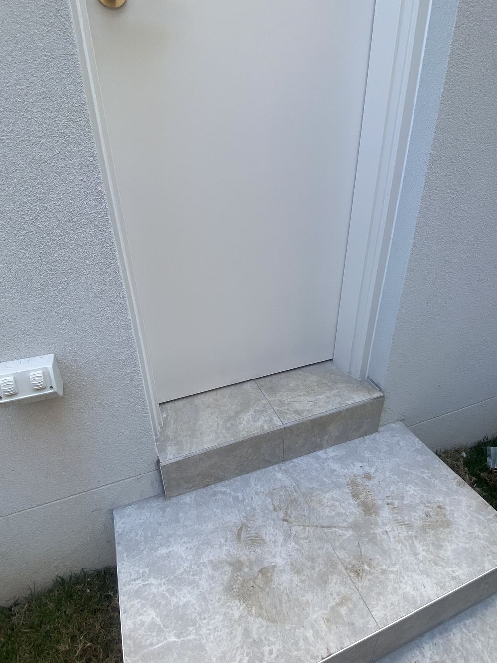 External doors missing the weather seals they need, found during a handover inspection in Rouse Hill