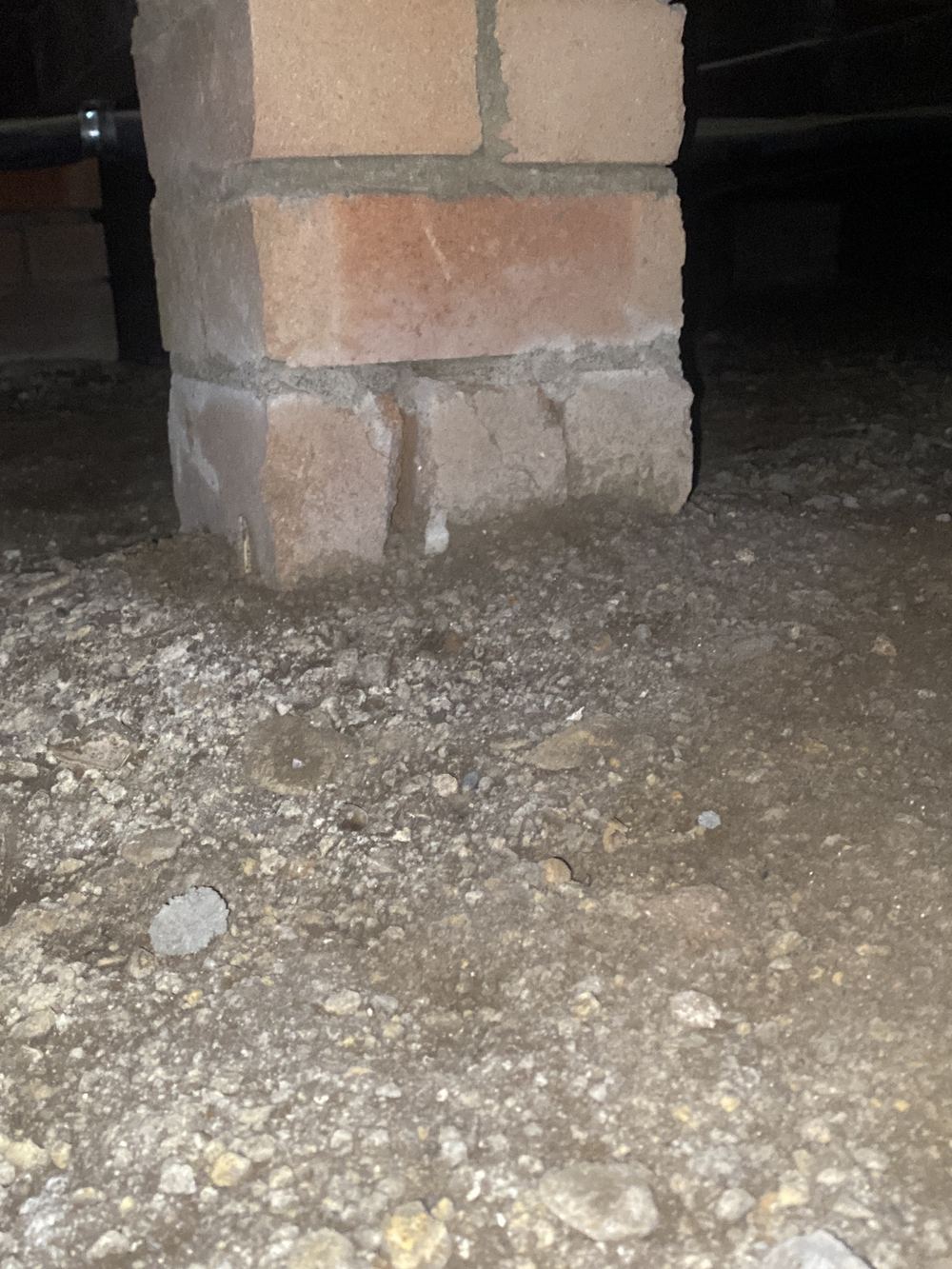 Subfloor piers built into damp soil and holding moisture, found during a defect investigation inspection in Winston Hills