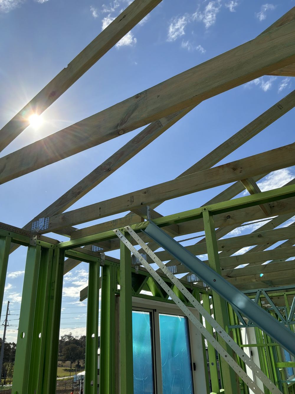 Roof bracing strap left slack across the trusses, found during a frame inspection in Rouse Hill