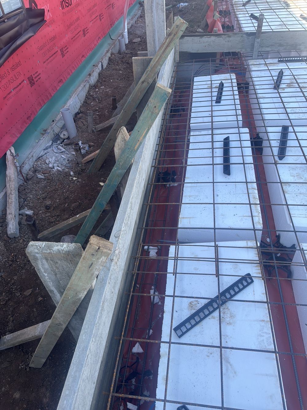 Deep edge beams on sloping Rouse Hill lots, and the Z bars that hold them in